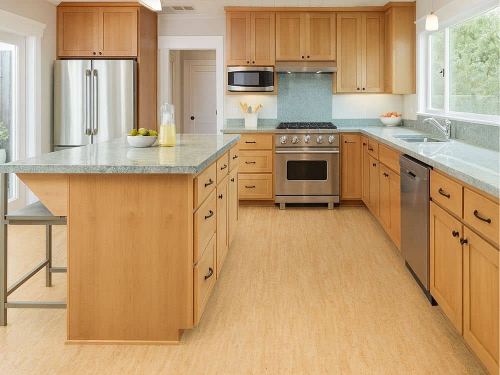 What properties of cork flooring make it suitable for kitchens?