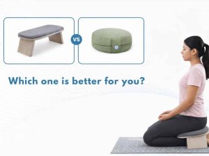 Side-by-side comparison image showing a meditation bench and a round meditation cushion with “VS” between them, while a woman sits upright in a kneeling meditation posture on a wooden meditation bench on a patterned mat, with the text “Which one is better for you?” displayed below.